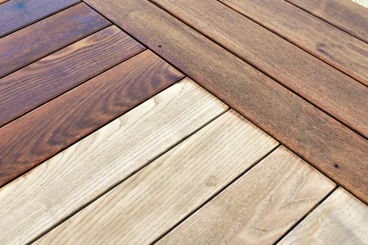 Freshly oiled, dried and untreated thermo-ash wood of a terrace